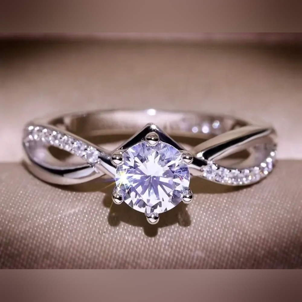 Elegant Silver Tone Ring with Sparkling Cubic Zirconia Size 5